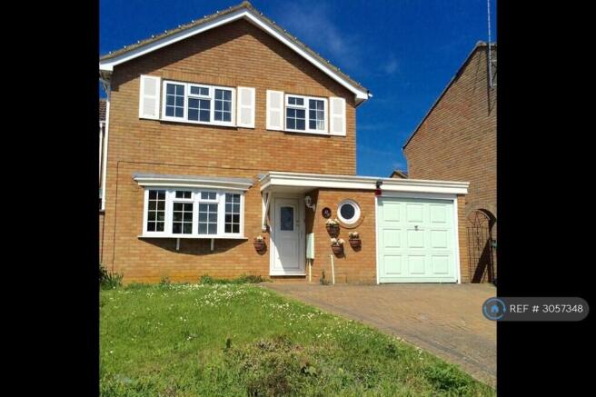 Front Elevation And Driveway