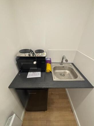 Efficient kitchenette with modern appliances...