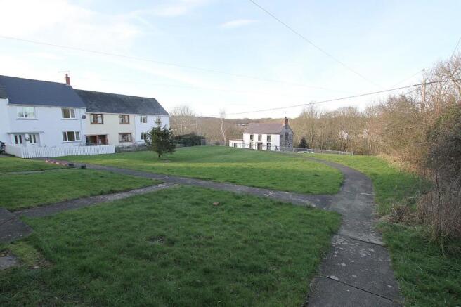 View over Green to front of property