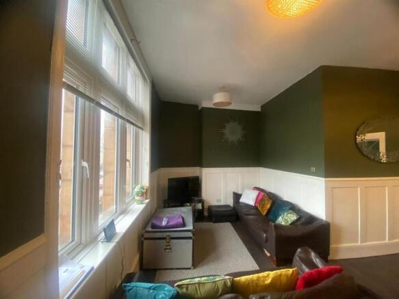 Warm, well-appointed living room with a large b...