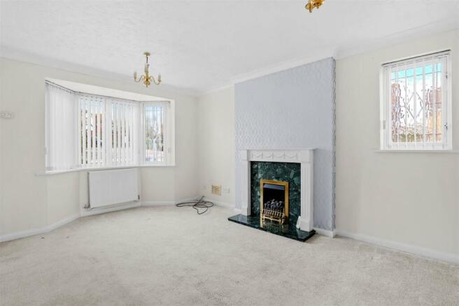 1 Hunt Avenue - sitting room (brochure).jpg