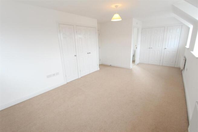 BEDROOM ONE TO FRONT