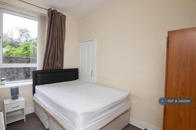 Rear-Facing Bedroom w Natural Light