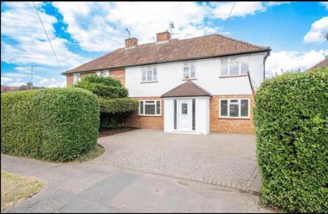 Well-presented semi-detached house with a wide ...