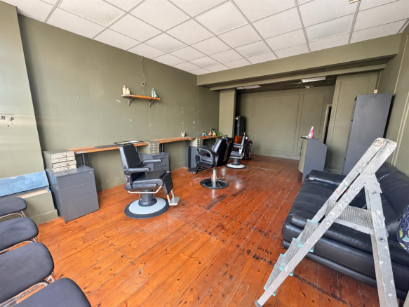 Naturally brightened barbershop interior.png