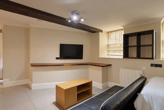 Living area with TV and sofa