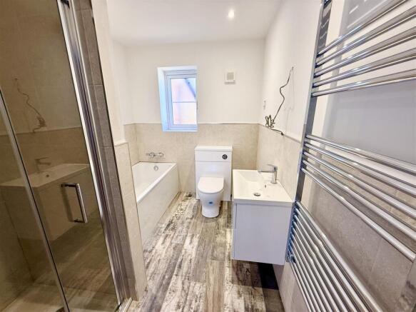 Example bathroom photo (plot 1 shown)