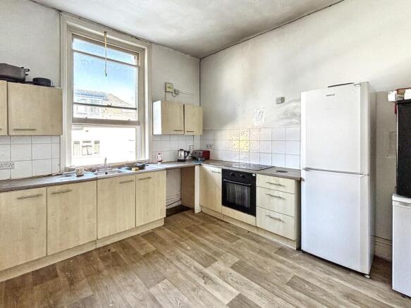 Bright and spacious kitchen with large window...