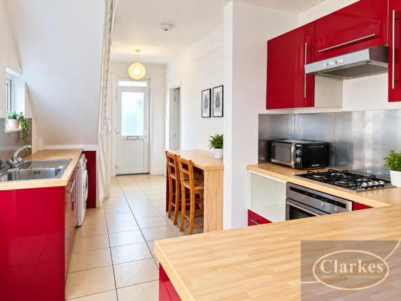 Glossy Red Galley Kitchen Retreat