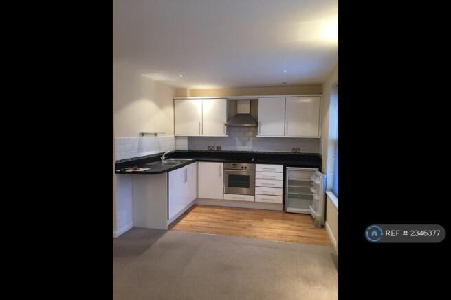 Kitchen With All Utensils Needed For Cooking 