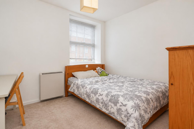 Minimalist Bedroom with Plush Toys.png