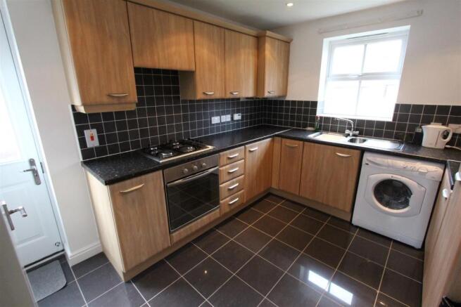 KITCHEN TO FRONT
