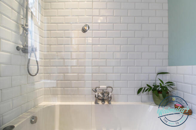 Bathroom beveled brick tiling