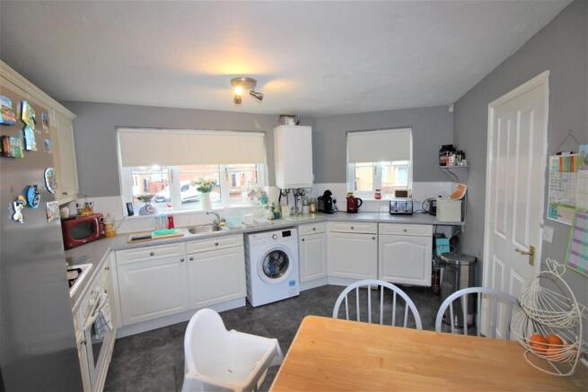 Bright modern kitchen with ample dining space...