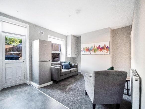 Bright, modern living room with neutral décor, ...