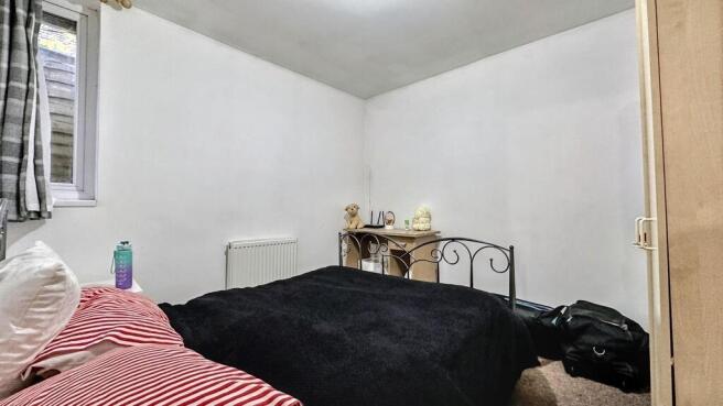 Bright double bedroom with dedicated study desk...