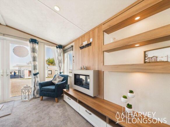 Modern caravan living room with built in fireplace