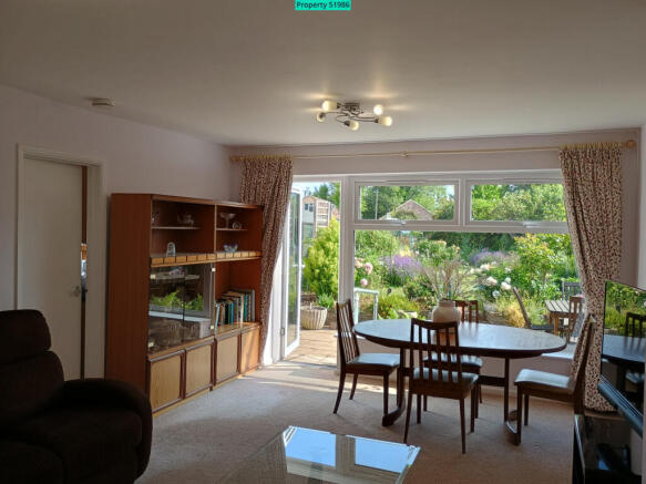 Lounge / dinning room leading to garden