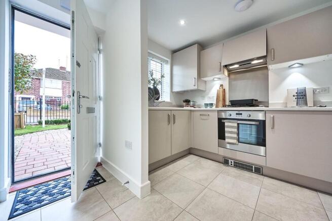 The kitchen sits at the front of the property