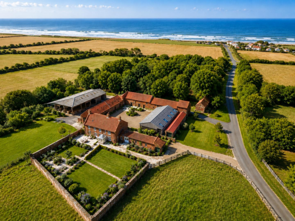 Whole site aerial with sea background.png