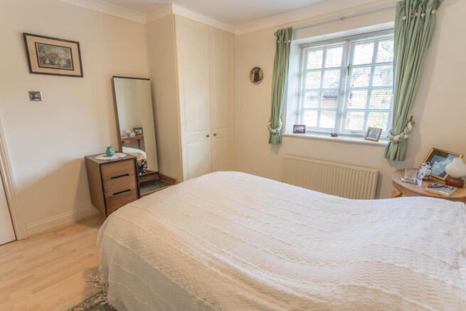 Bedroom 2 with wardrobes