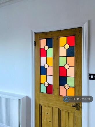 Stained Glass Door To Hallway