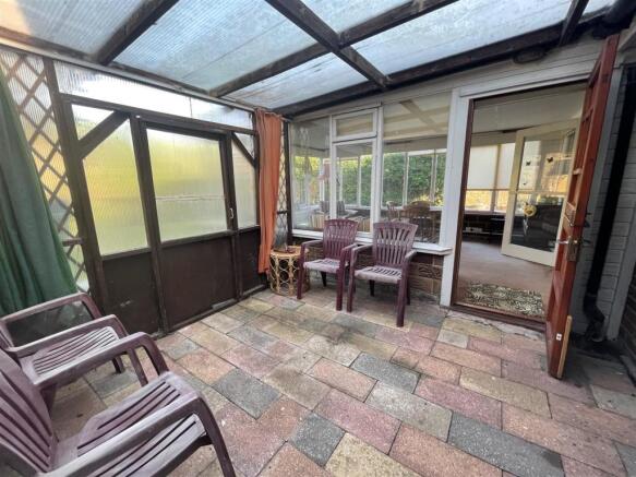 COVERED LEAN TO