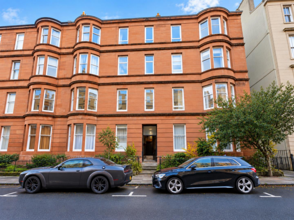 Red Sandstone Tenement with Parked Cars.png