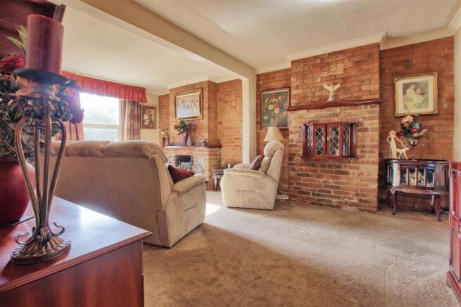 Living room showing entrance to dining.jpg