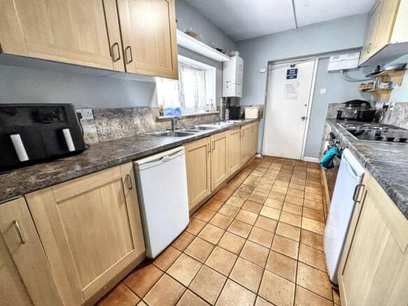 Spacious modern kitchen with ample counter spac...