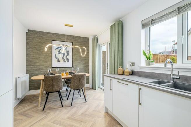 3 bedroom showhome | open plan kitchen, dining, and family area with french doors to rear garden