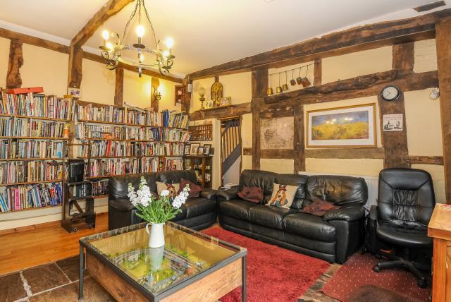 Heavily beamed walls of the sitting room