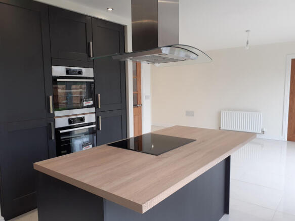 Large kitchen/dining/family area with bi-fold doors 