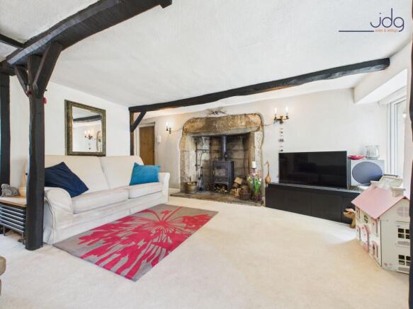 Cosy Lounge with exposed beams and Ingle-nook fireplace