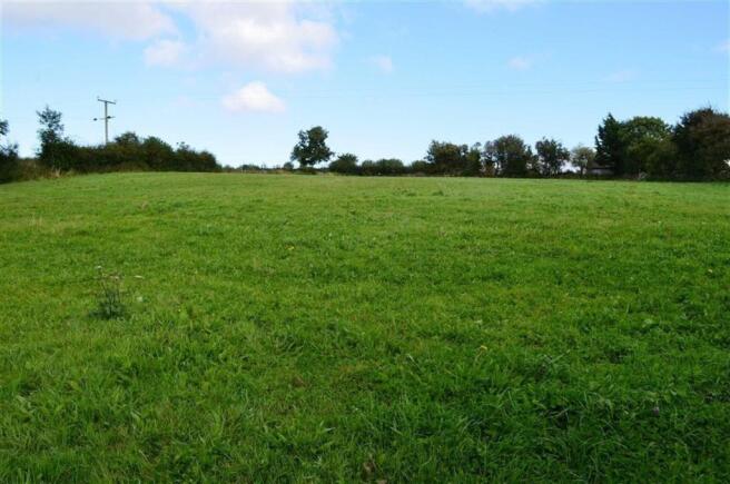 PHOTO OF LAND TO REA