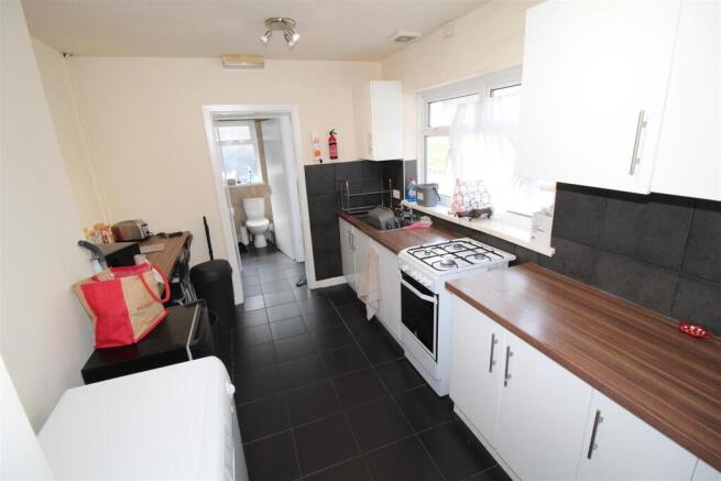 Bright kitchen with modern worktops and storage...