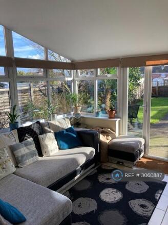 Separate Bright Lounge Opening Into Garden