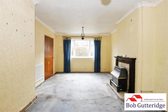 THROUGH LOUNGE/DINING ROOM