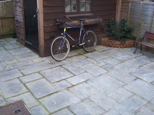 paved garden at rear