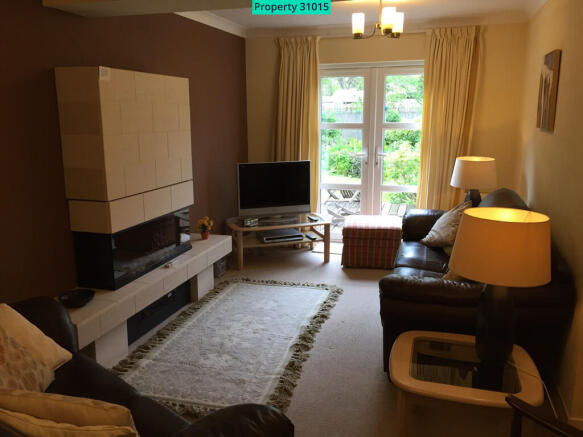 Lounge with door to 