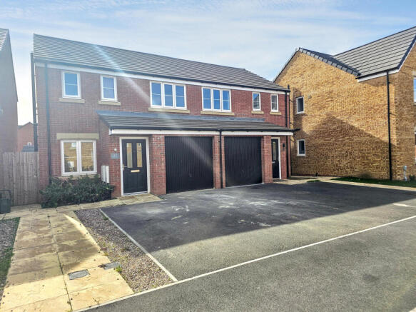 Front exterior and driveway