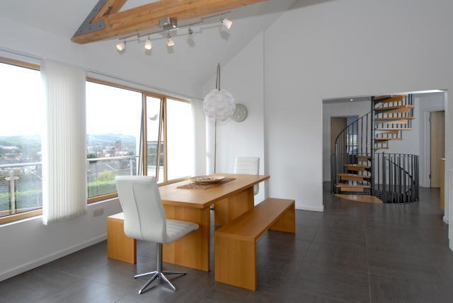 Dining Area Leading Through To Spiral Staircase