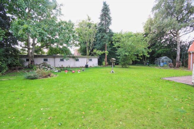 Garden with large workshop