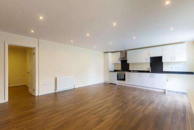 Flat Lounge Open To Kitchen