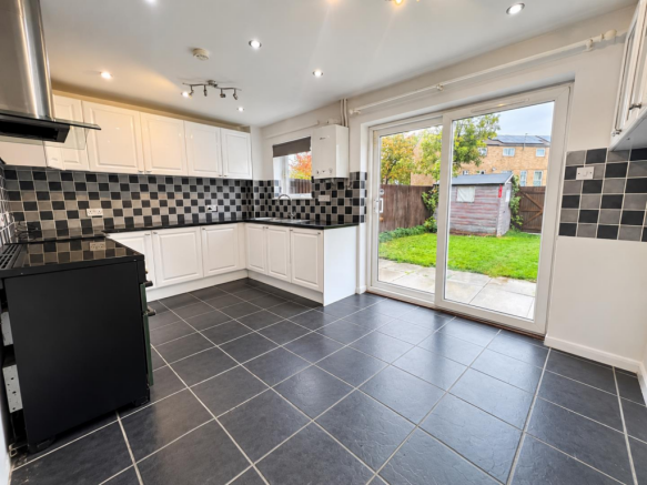 Modern Kitchen Opening onto Garden.png