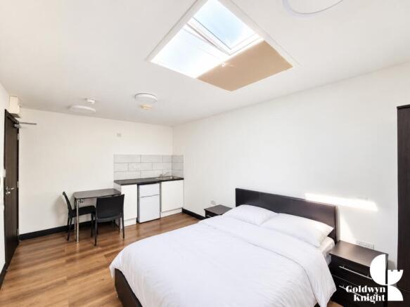 Modern Minimalist Studio with Skylight