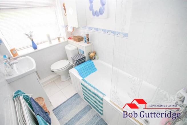 FULLY TILED BATHROOM