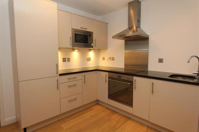 Modern kitchen with sleek gloss cabinetry...