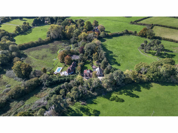 Warren Cottage surrounded by footpathed open countryside