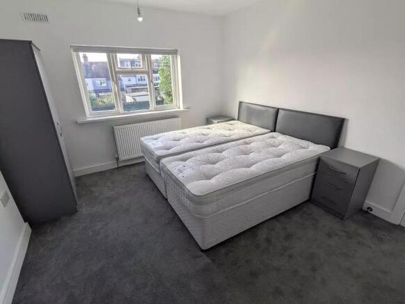 Bright, modern master bedroom with ample space...